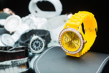 Image showing Yellow watches women, compared to other hours