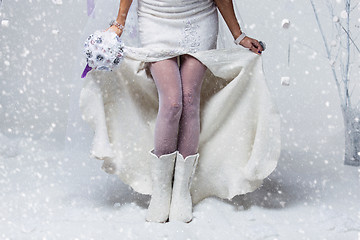 Image showing Bride in wool boots