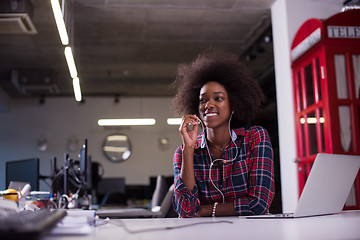 Image showing portrait of a young successful African-American woman in modern 