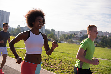 Image showing multiethnic group of people on the jogging