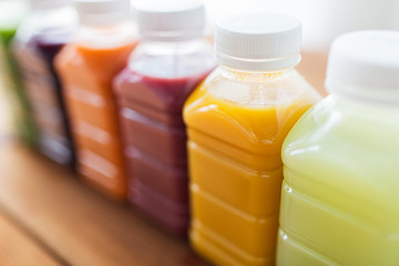 Image showing bottles with different fruit or vegetable juices