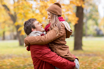 Image showing happy young couple meeting in autumn park