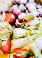 Image showing close up of dish with sugared fruit dessert