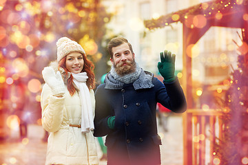 Image showing happy couple walking in old town