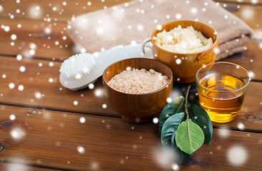 Image showing himalayan pink salt, body scrub, brush and honey