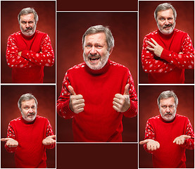 Image showing Elderly smiling man on a red background