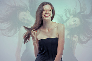 Image showing The young woman\'s portrait with happy emotions