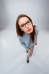 Image showing The young business woman on gray background