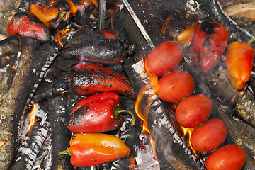 Image showing fried vegetables on a fire