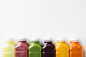 Image showing bottles with different fruit or vegetable juices