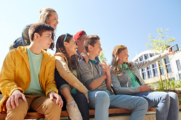 Image showing happy teenage students taking selfie by smartphone