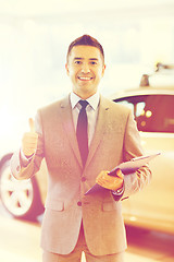 Image showing happy man at auto show or car salon