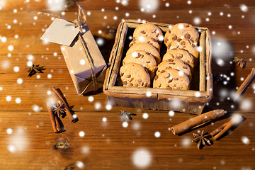 Image showing close up of christmas oat cookies on wooden table