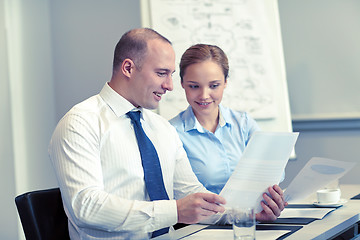 Image showing smiling business people meeting in office