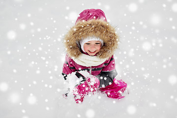 Image showing f happy little child or girl with snow in winter