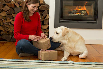 Image showing Wrapping presents for Christmas