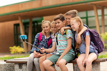 Image showing happy elementary school students taking selfie