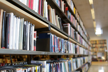 Image showing bookshelves with books at school library