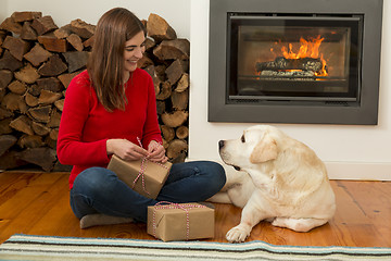 Image showing Wrapping presents for Christmas