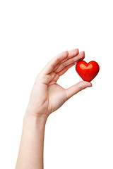 Image showing Woman\'s hand with heart symbol isolated