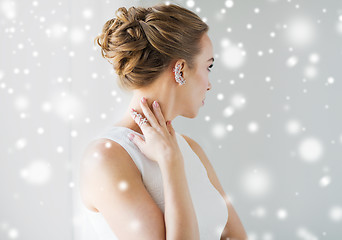 Image showing close up of beautiful woman with ring and earring