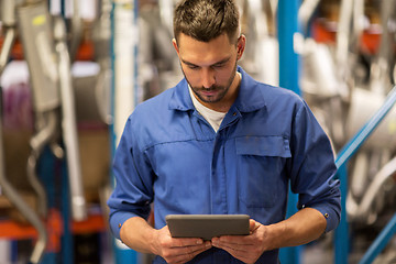 Image showing auto mechanic or smith with tablet pc at workshop