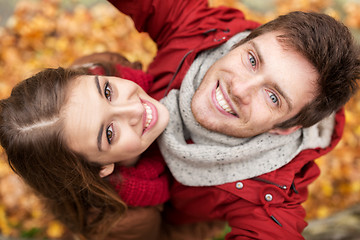 Image showing close up of happy couple taking selfie at autumn