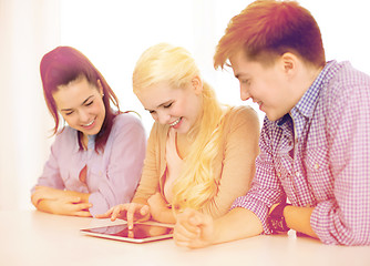 Image showing smiling students with tablet pc computer at school