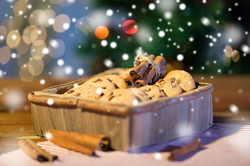 Image showing close up of christmas oat cookies on wooden table