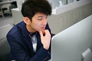 Image showing asian man thinking