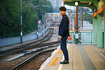 Image showing Asia man waiting train