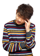 Image showing  young thoughtful man isolated over white background