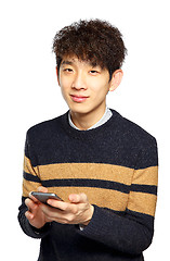 Image showing Young man using mobile phone on white background