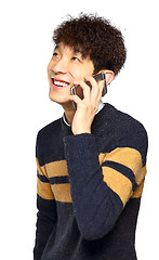 Image showing Happy young man talking on mobilephone