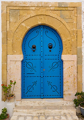 Image showing Old Blue door with arch from Tunisia