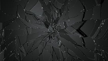 Image showing Shattered glass sharp Pieces on black
