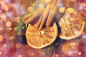 Image showing christmas fir branch, cinnamon and dried orange