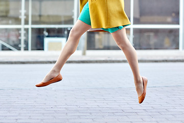 Image showing young woman or teenage girl legs on city street