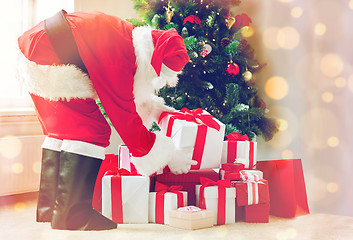 Image showing man in costume of santa claus with presents