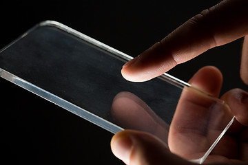 Image showing close up of businessman with glass smartphone