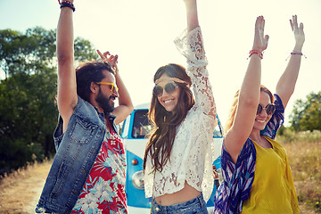 Image showing happy young hippie friends dancing outdoors