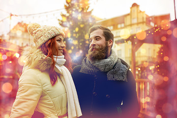 Image showing happy couple walking in old town