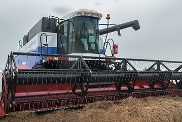 Image showing New harvester stands on an exhibition platform