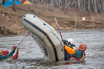 Image showing Athletes work actions when capsizing raft