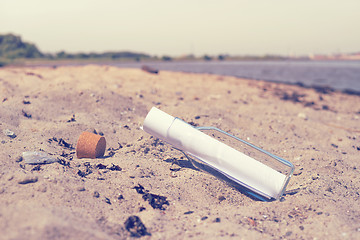 Image showing Message in a bottle on a beach