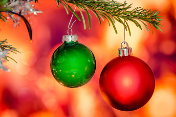 Image showing Red and green xmas baubles