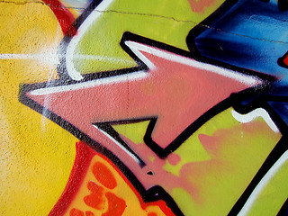 Image showing Yellow graffiti arrow