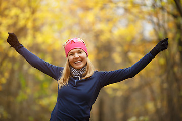 Image showing Girl doing exercises in forest