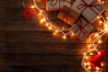 Image showing Boxes, presents on wooden background