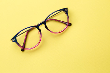 Image showing Blue-pink glasses with clear lenses